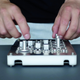 Illustration for article titled These Knobs and Sliders Turn an iPad Into a Custom Tactile Interface
